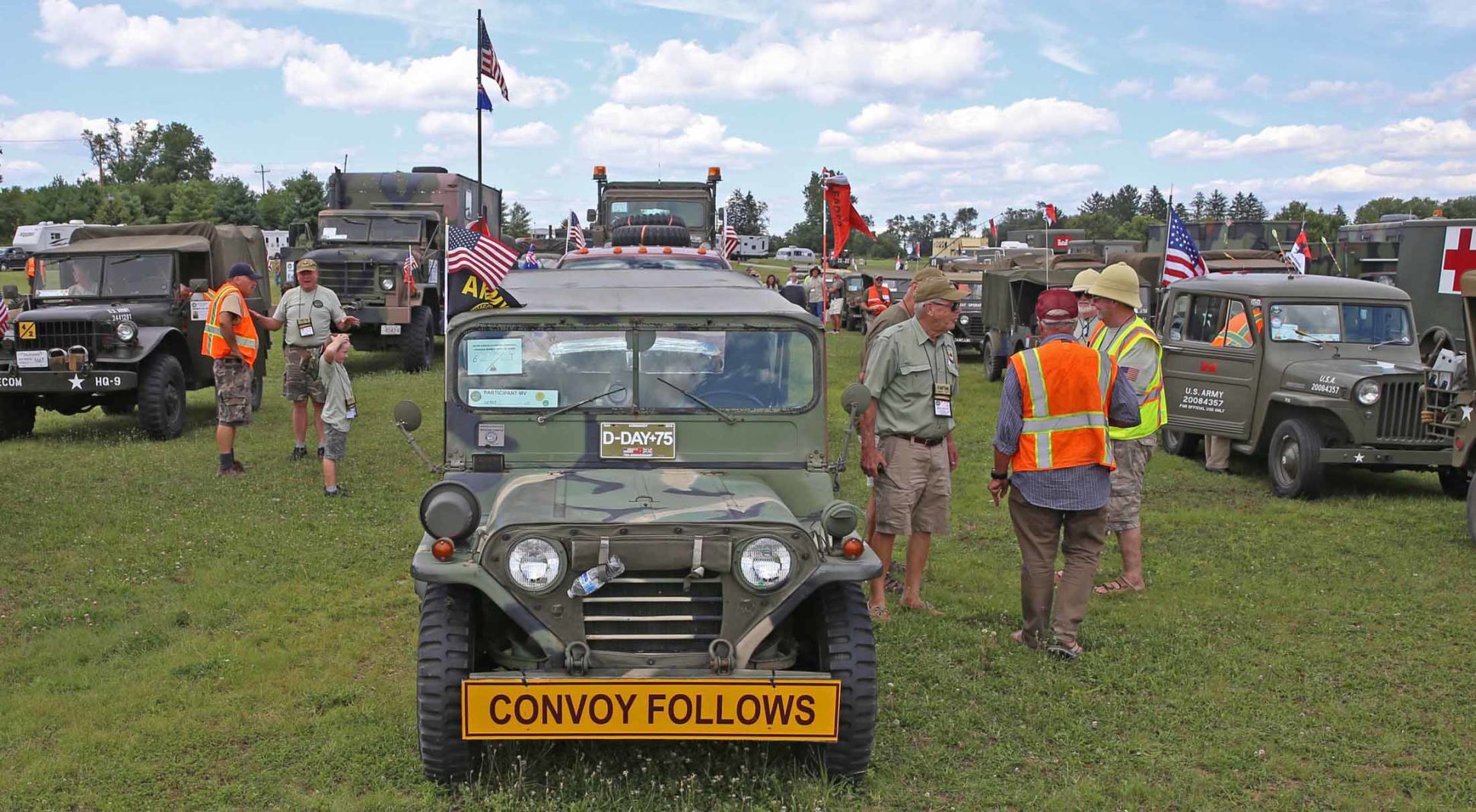 Vintage military convoy stops in Adams
